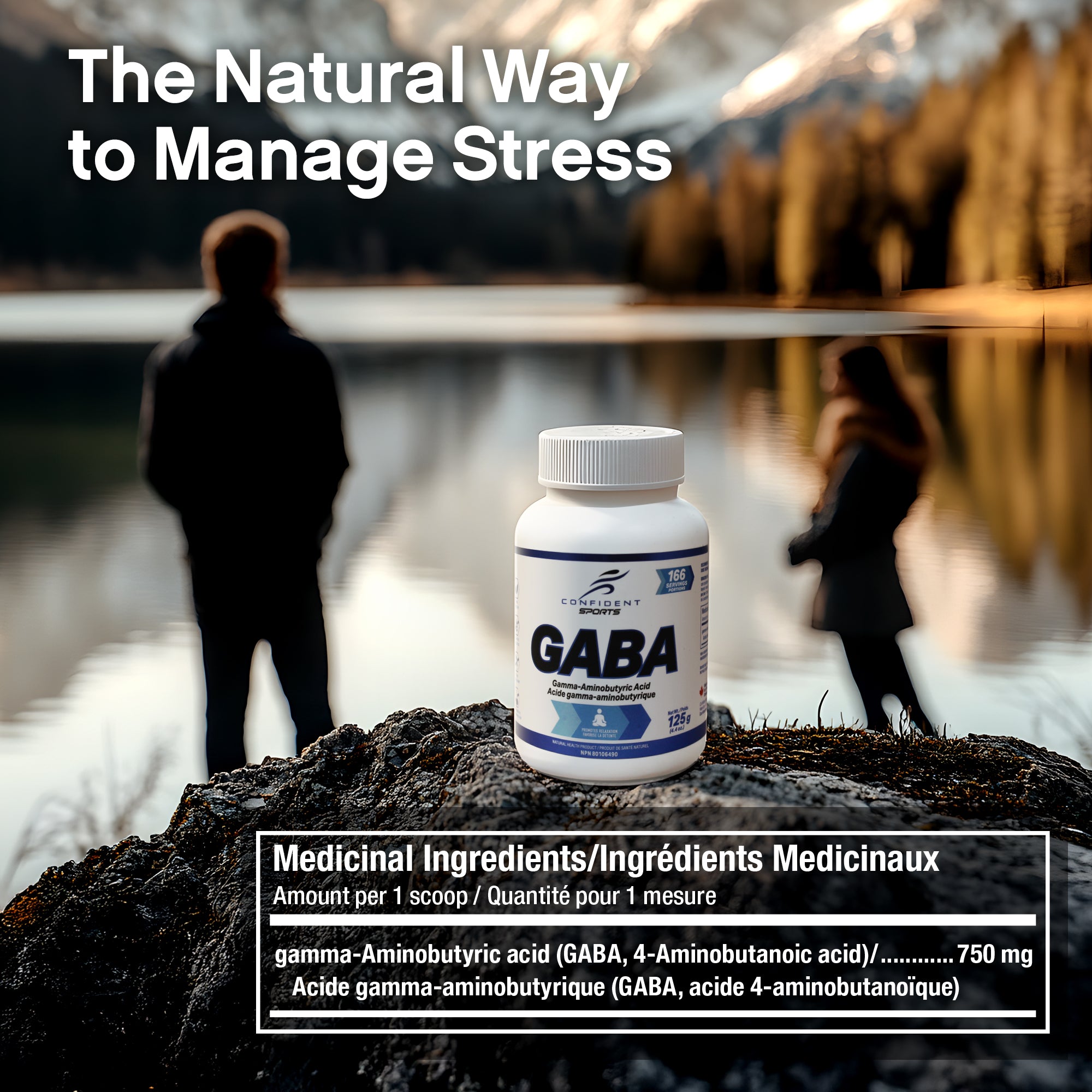 GABA in the foreground with a happy couple enjoying the view of a Canadian lake